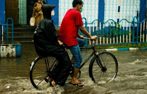 Local coming back on street again after flood descends